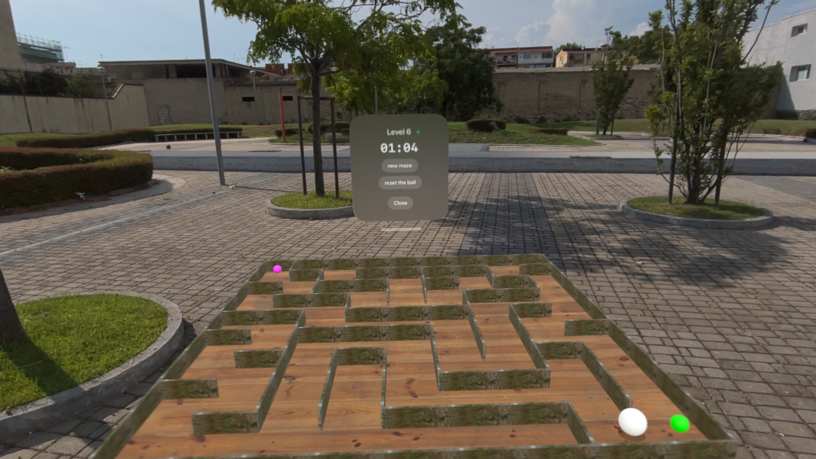 Tilting a wooden maze to roll the marble, with a level timer